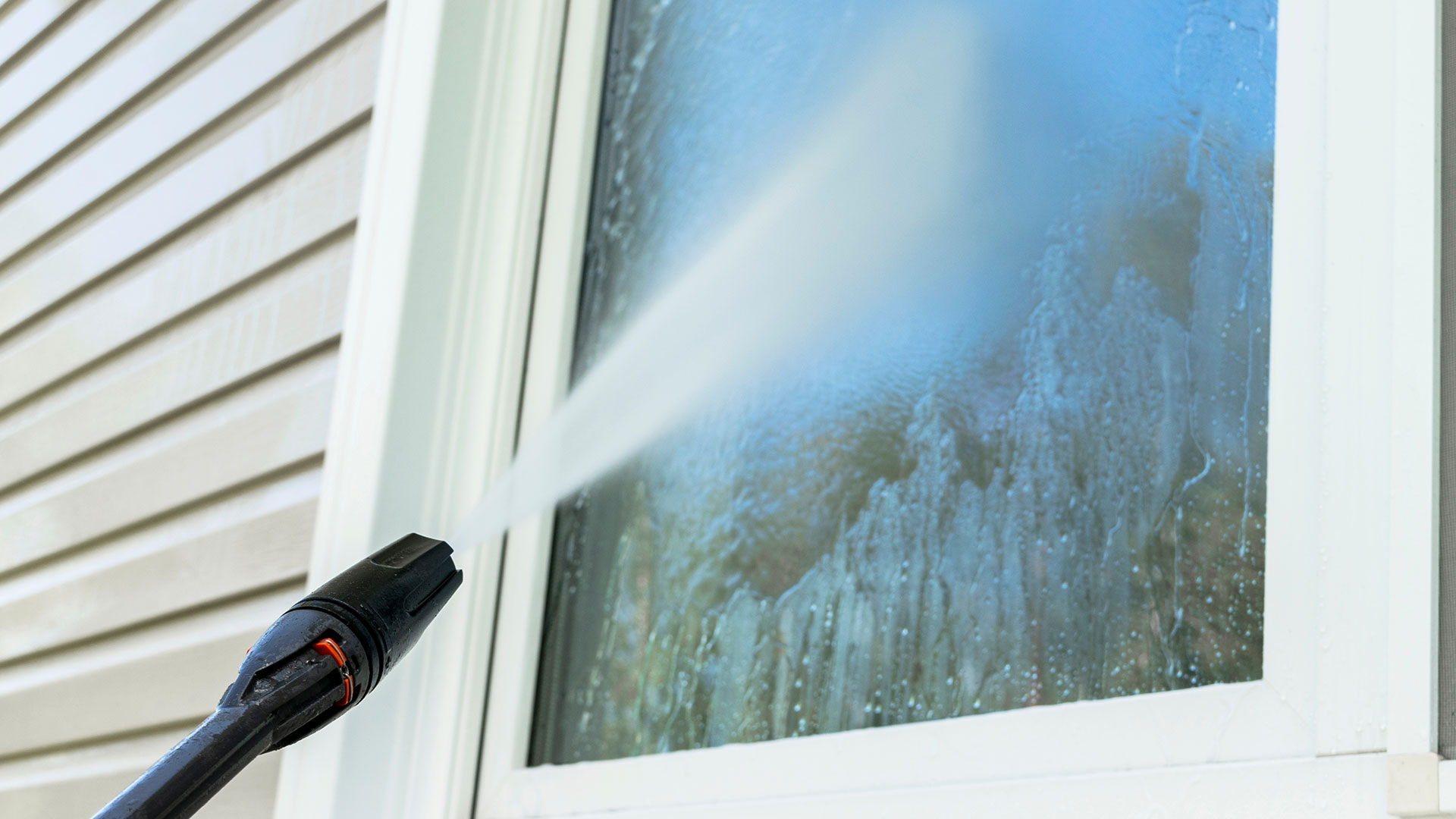 Window cleaning services at a home property in Calgary, Alberta.